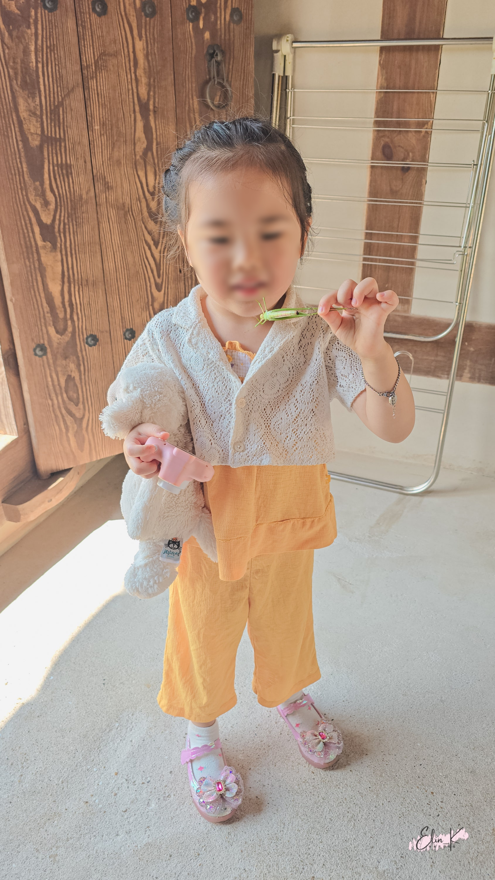 Child playing in the hotel courtyard