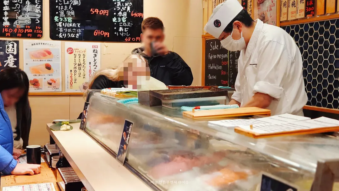 Chef Preparing Sushi
