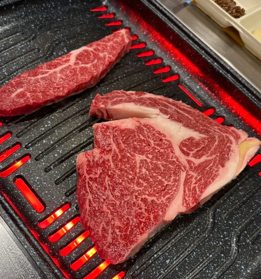 Grilling beef close up