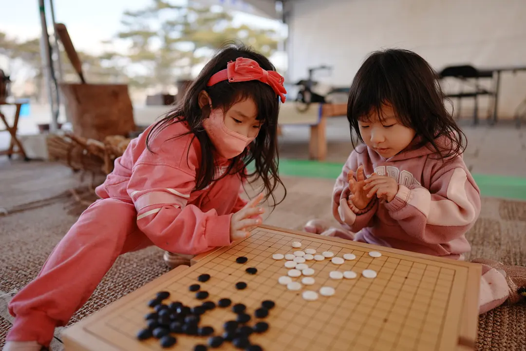 Playing traditional board games