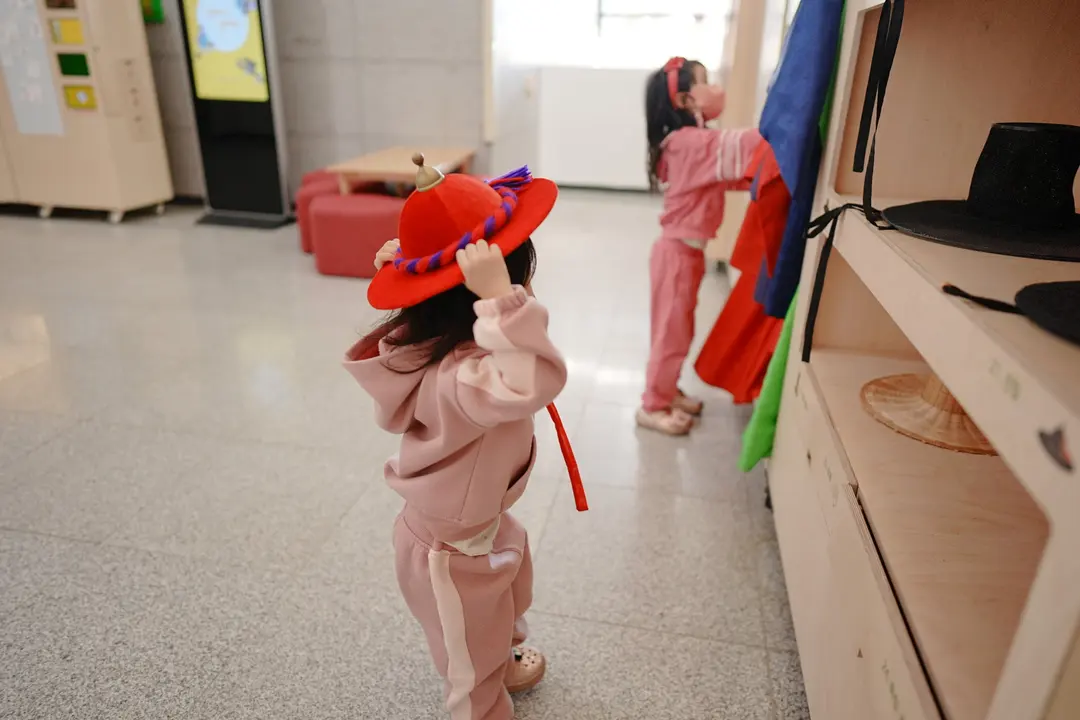 Trying on historical Korean robes