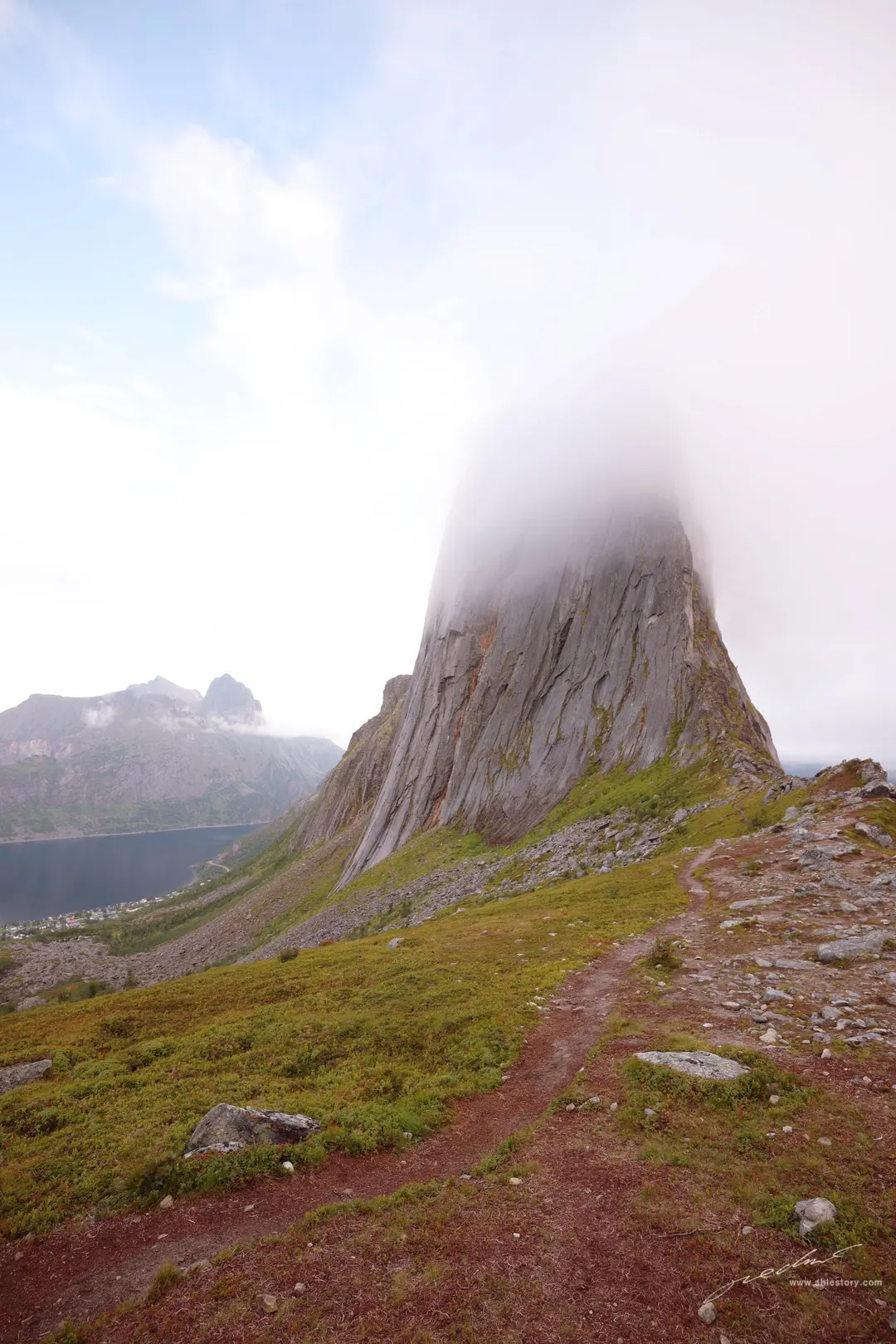 We kept waiting because the sky beyond looked clear, but we never got to see the actual summit.