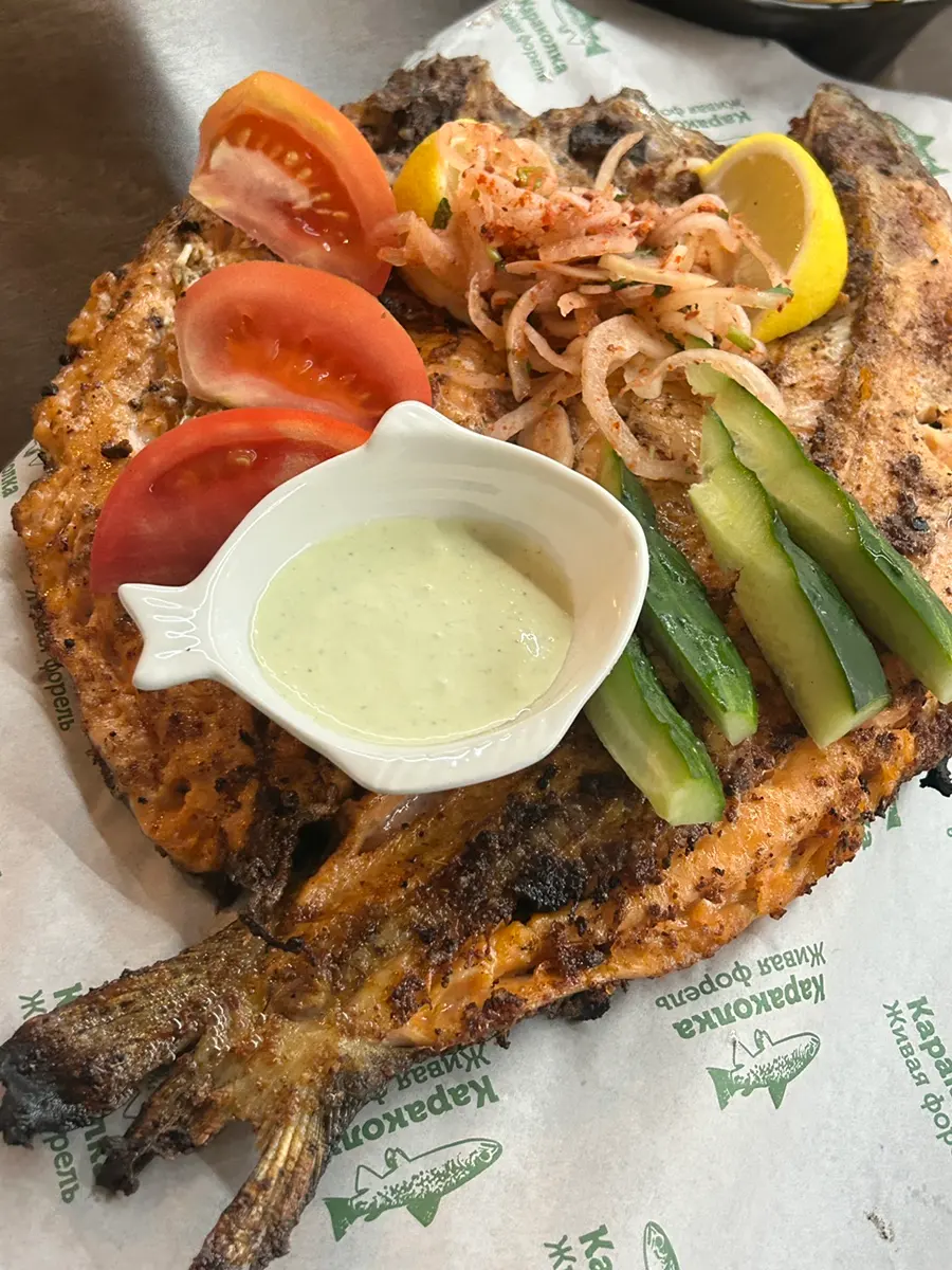 Drizzling Lemon on Trout