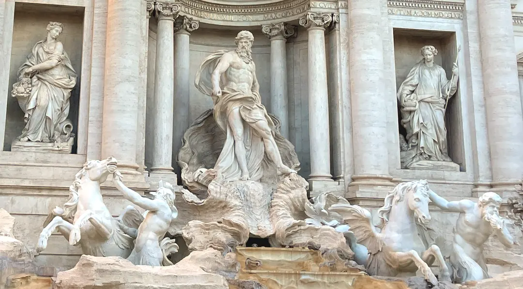 Taking photos at the Trevi Fountain