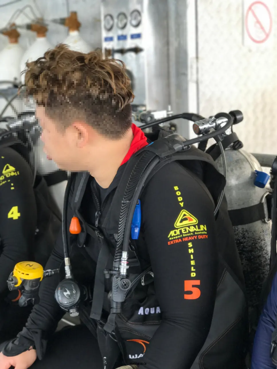 Diver swimming with sea turtle