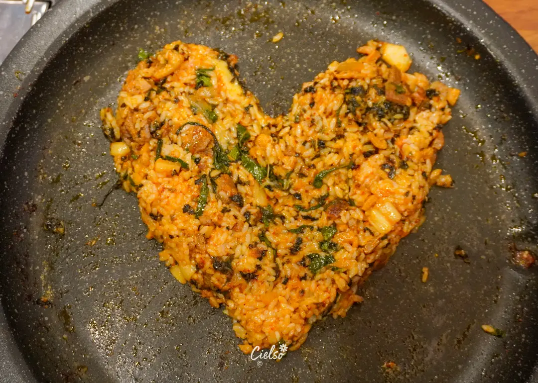 Mixing fried rice