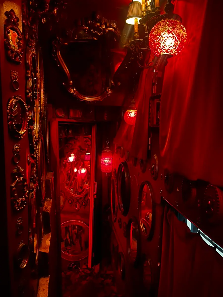 Red-lit staircase to Aoyama Tunnel
