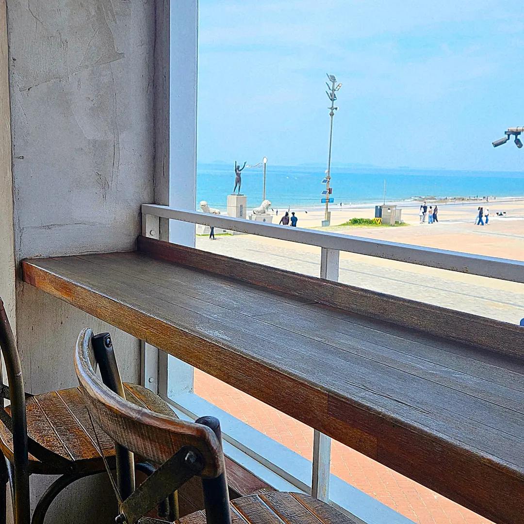 Sitting on the terrace overlooking the beach