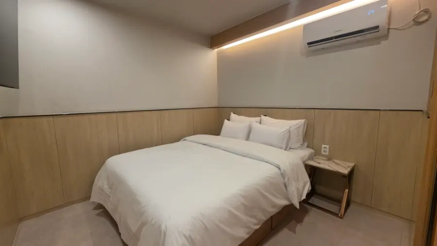 Bedroom 2 at the end of the hallway