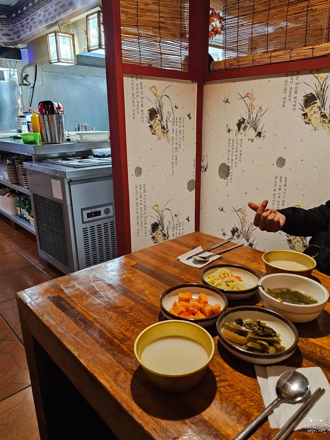 You can see them frying the anchovies in the open kitchen! Also, my husband's terrible finger heart haha