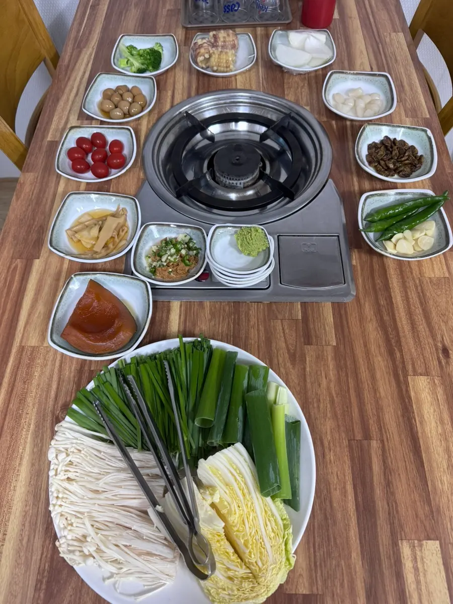 Table full of side dishes