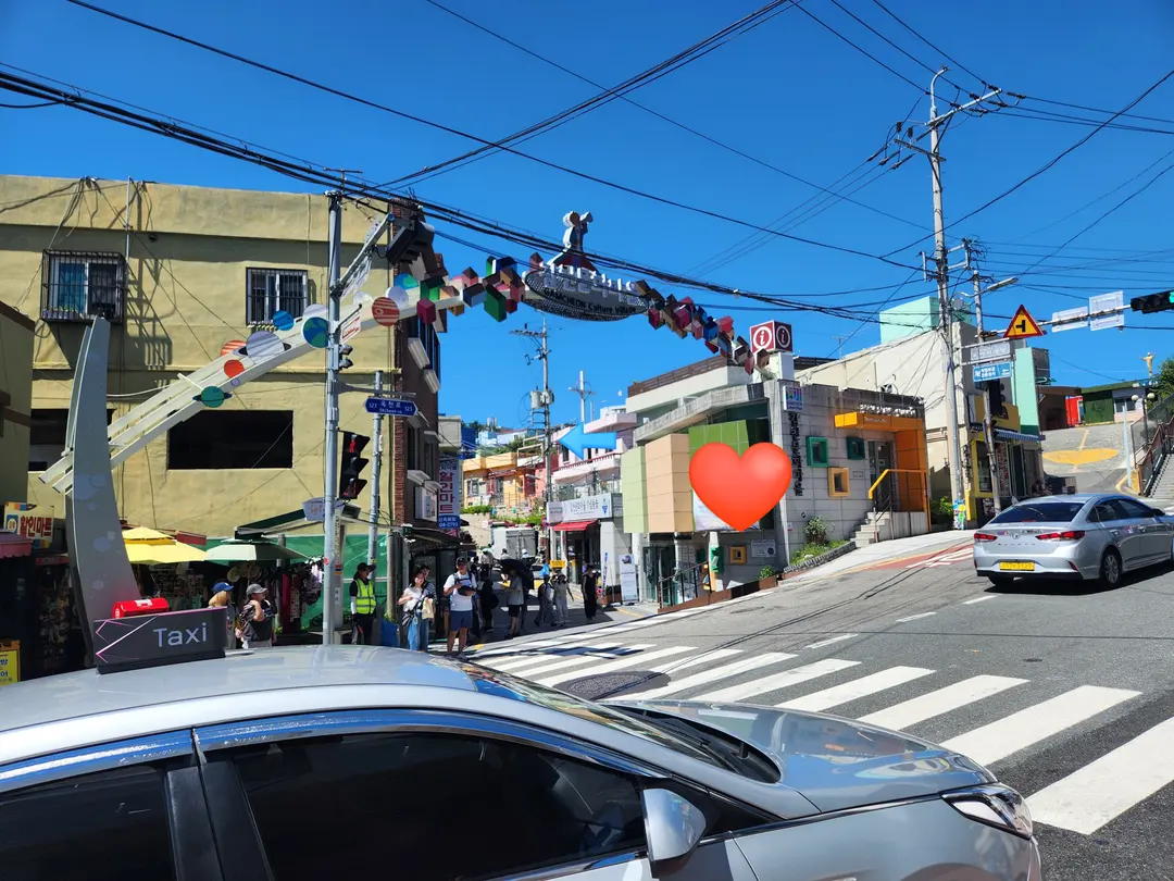 Entrance to Gamcheon Culture Village with information center marked