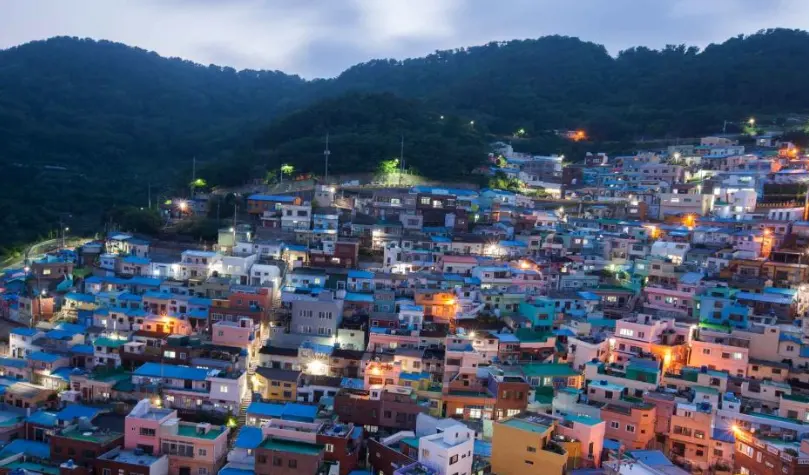 Gamcheon Culture Village at dusk with lights