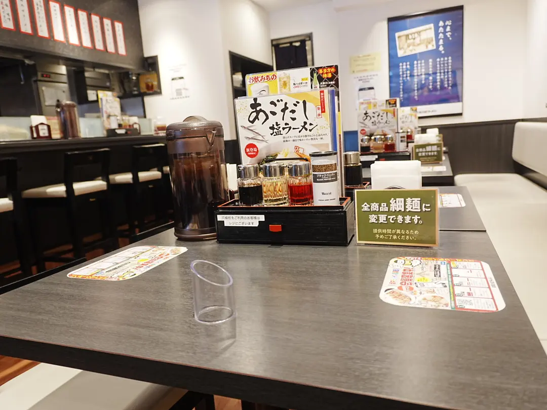 Neatly arranged menus and chopsticks