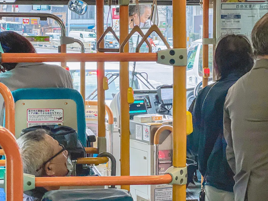 Scanning QR code on Osaka bus
