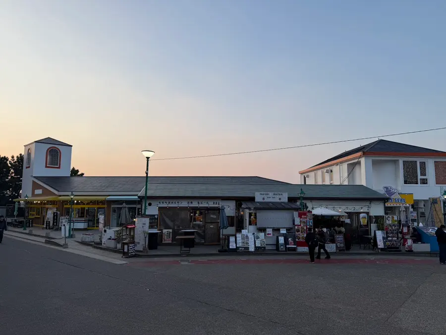 Shops and cafes along Momochi Beach boardwalk