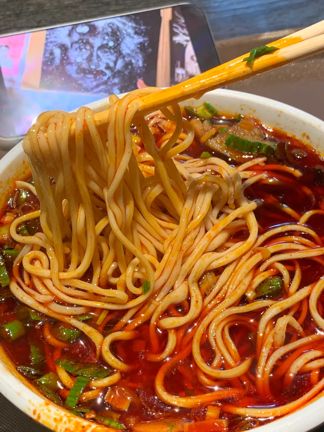 A close-up of the chewy, hand-pulled noodles