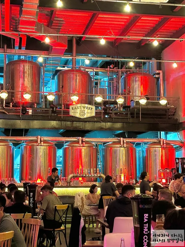 เที่ยวโฮจิมินห์: ร้านเบียร์คราฟต์ East West Brewing Company เขต 1 พร้อมเมนูหอยทากสุดเด็ด