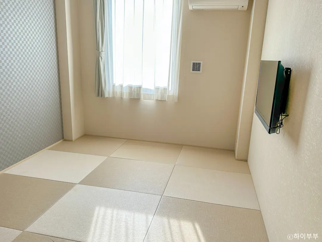 Traditional Japanese tatami room with bedding
