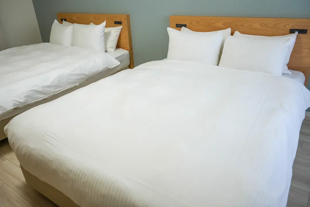 Hotel room with two double beds