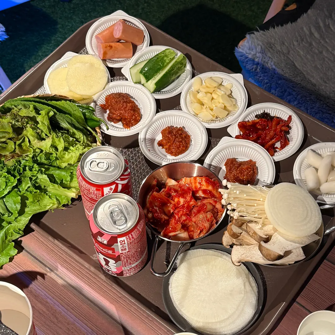 Full table with meat and side dishes