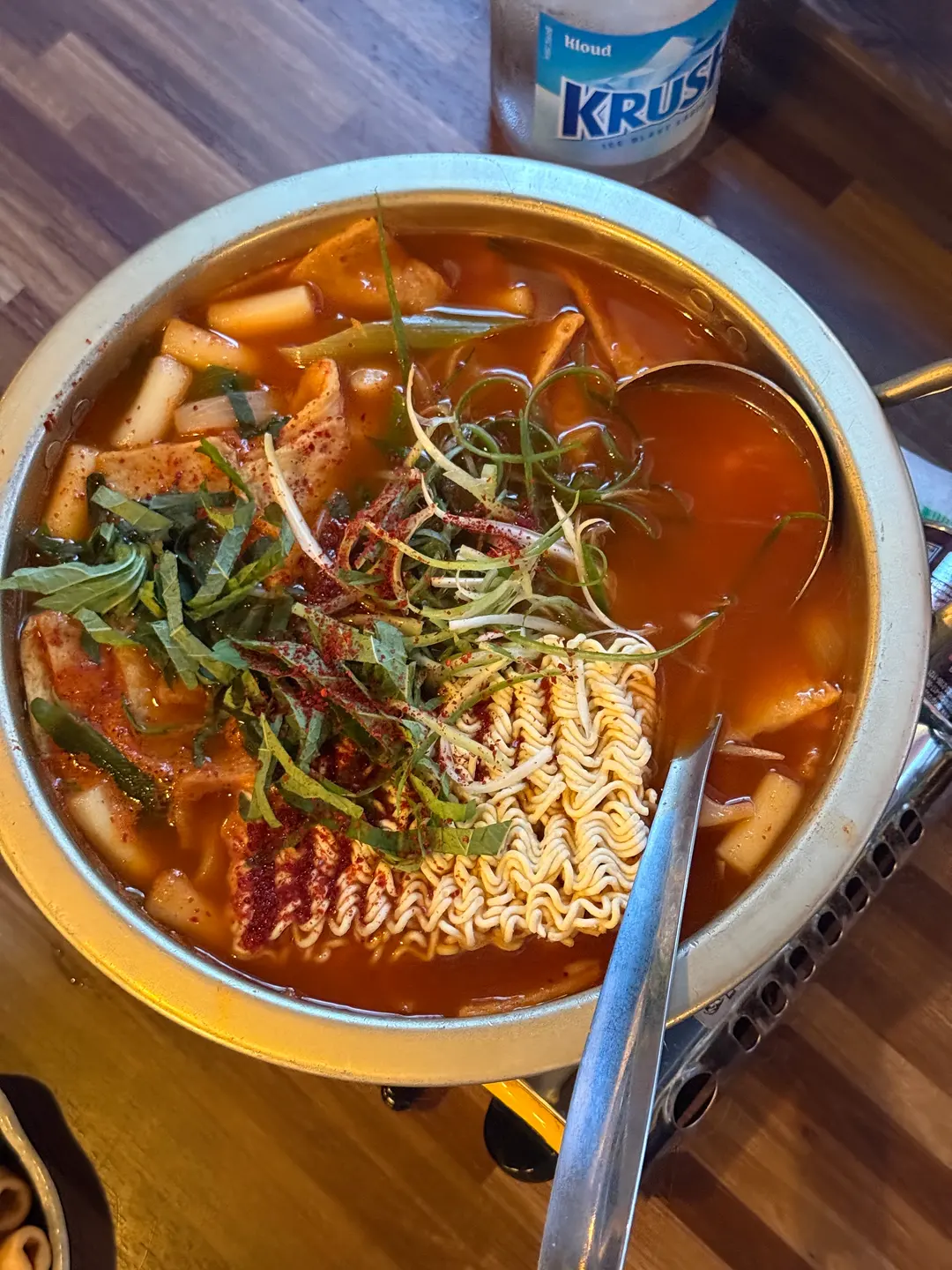 Dalbit Tteokbokki served in a traditional aluminum pot