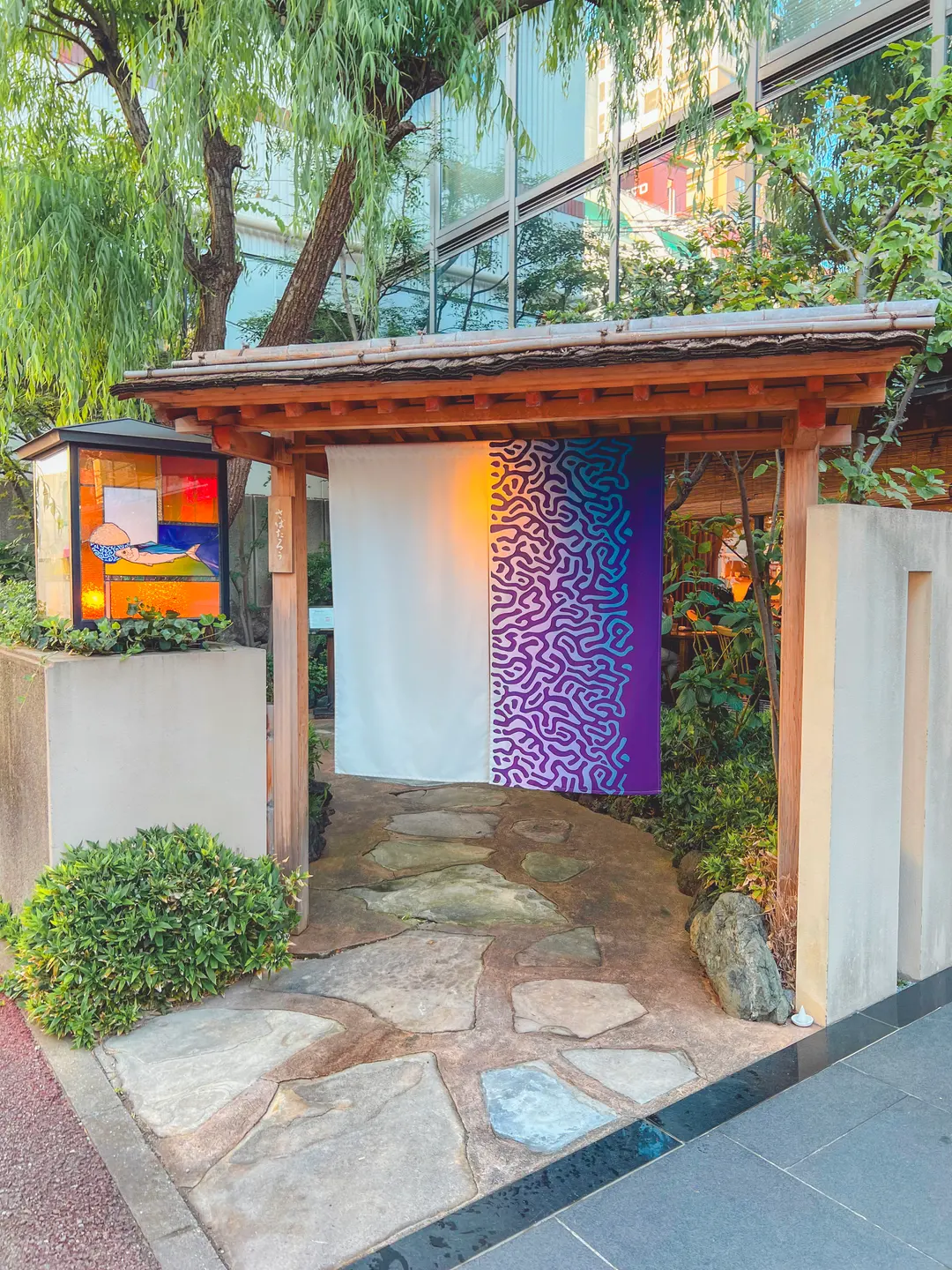 The exterior of Sabatarō restaurant, featuring a traditional Japanese facade.