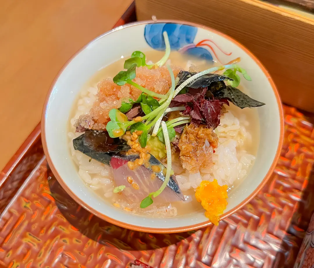 Another close-up of a Japanese set meal, highlighting the fresh ingredients and careful presentation.
