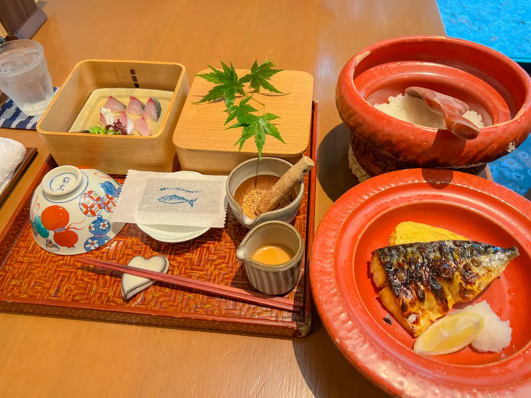 A beautifully arranged Japanese breakfast set at Sabatarō, with grilled fish, rice, miso soup, and various side dishes.