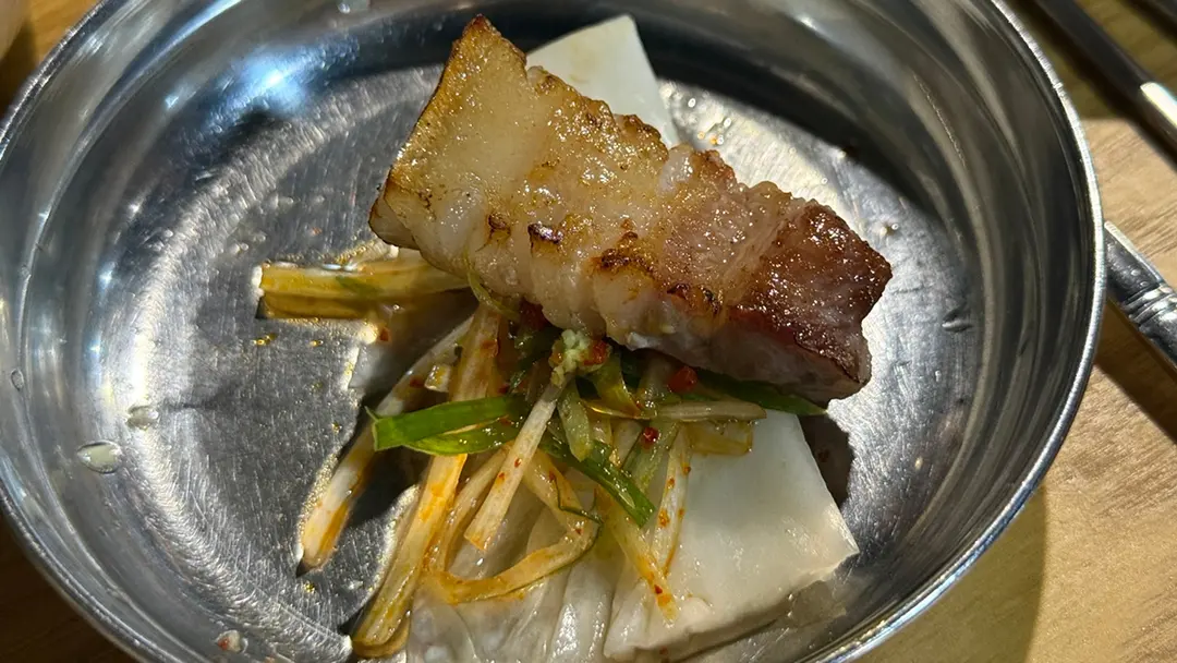 Donbul 1971 pork belly wrap with kimchi and scallions