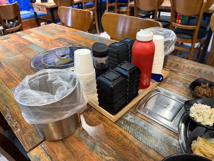 Table setting with basic condiments and side dishes