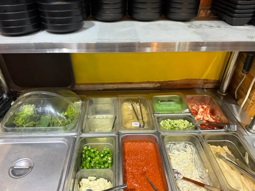 Self-service bar with fresh side dishes