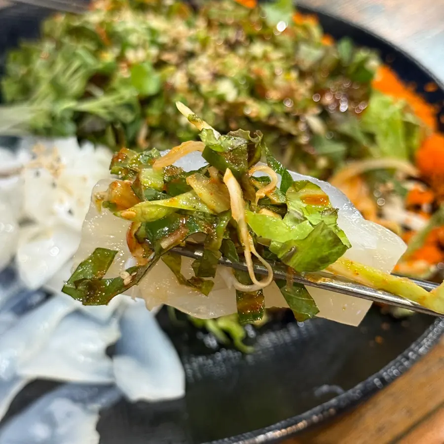 Close-up of sliced cuttlefish sashimi