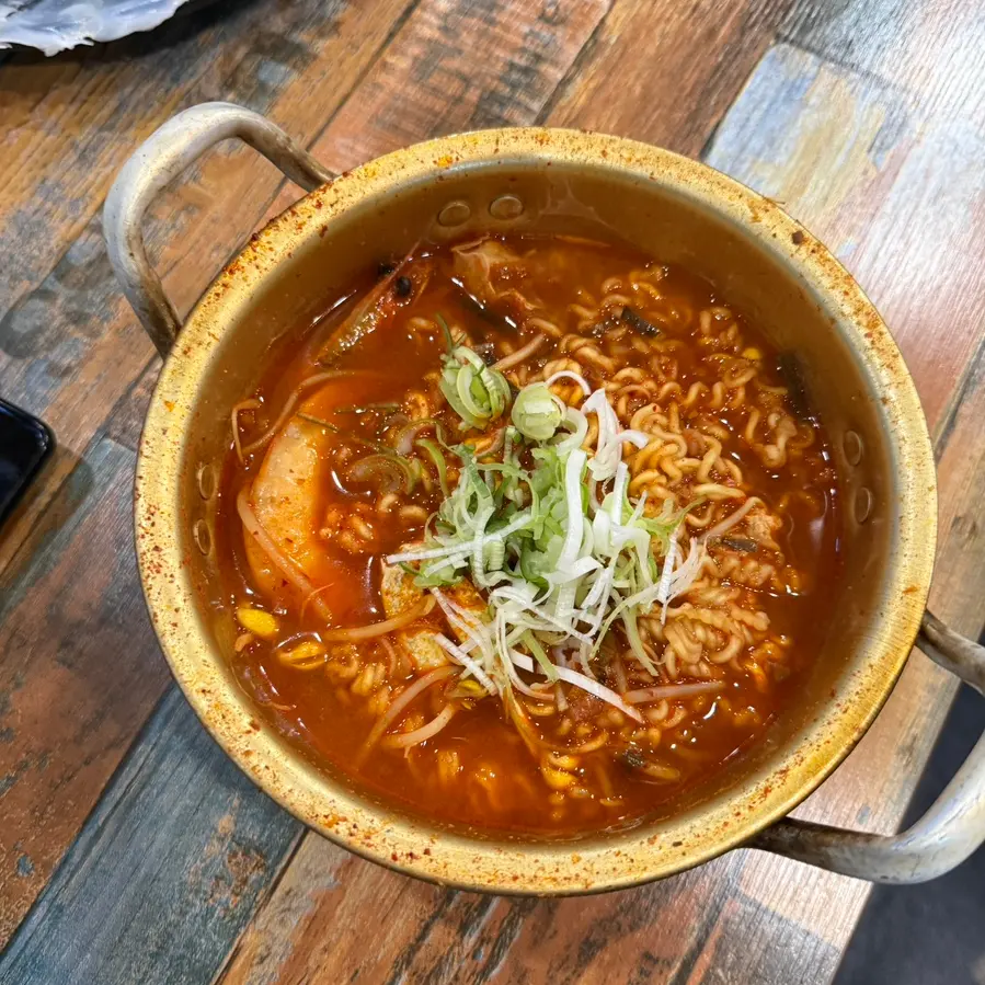 Hearty seafood ramen with shrimp, crab, and clams