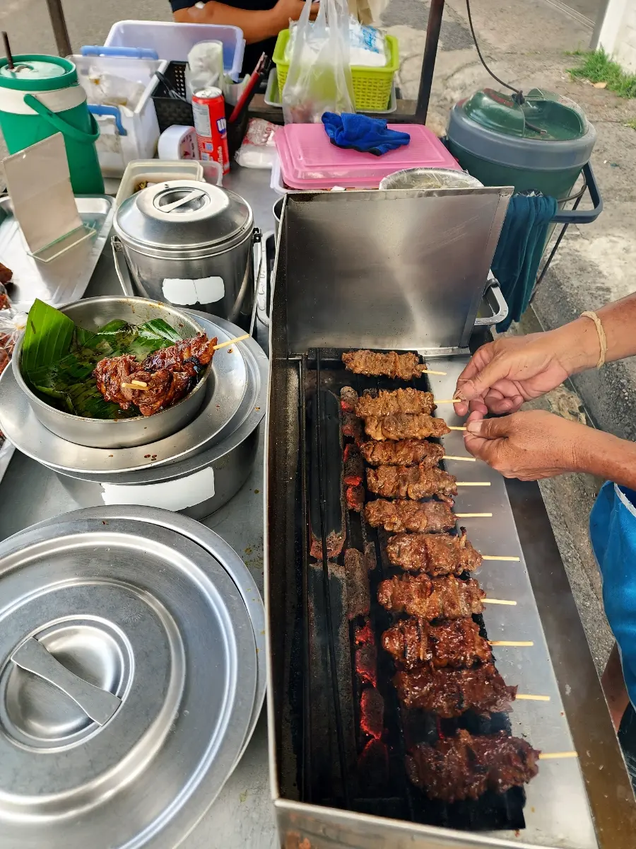 Mu Ping skewers and sticky rice