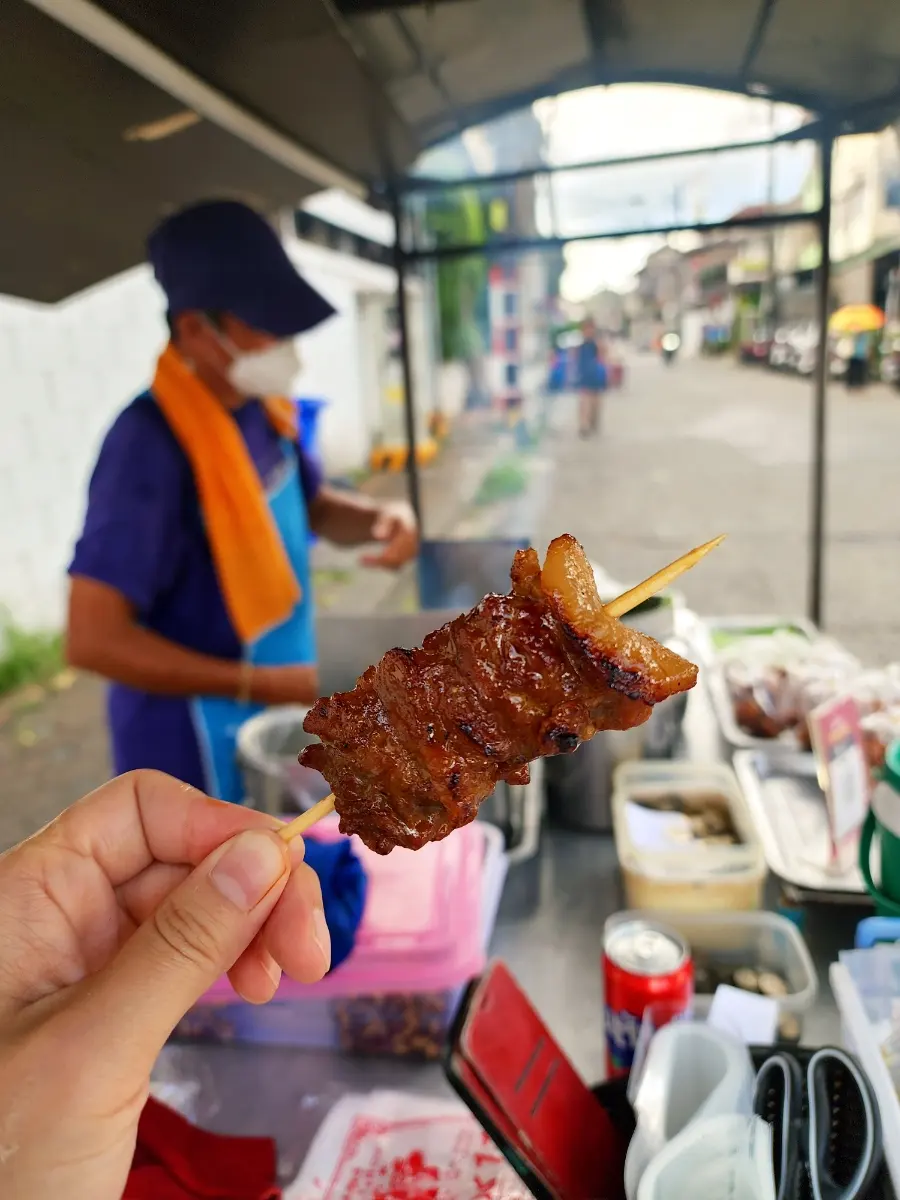 Mu Ping skewers in a banana leaf cone