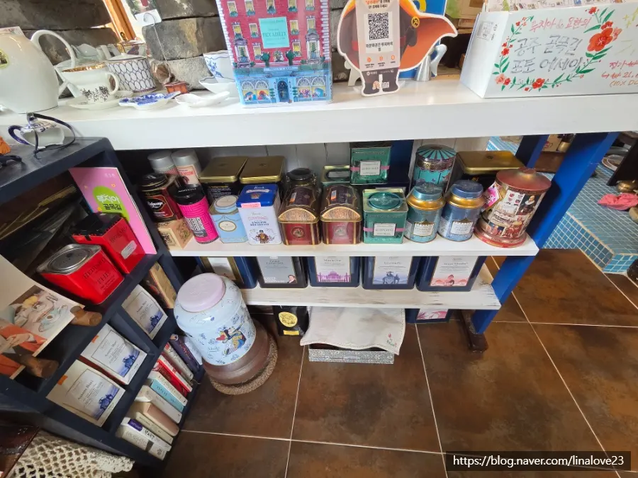 Collection of Black Tea Tins at Lucia's Garden Cafe in Gongju