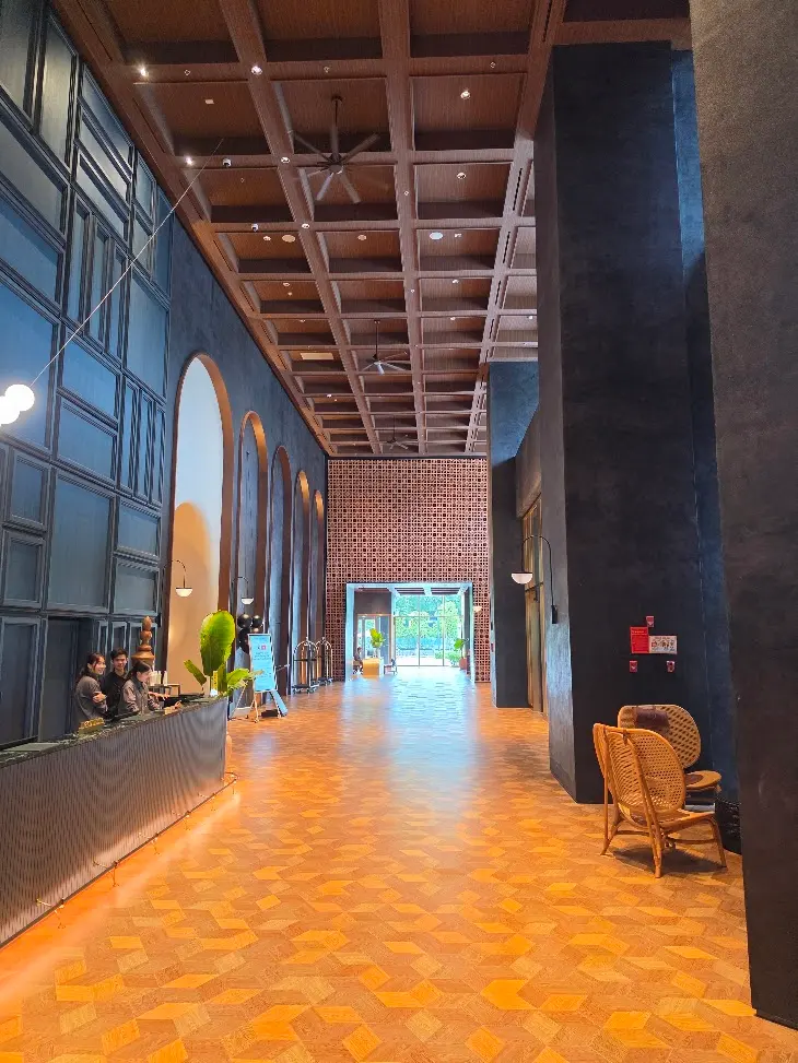 Indoor walkway connecting L7 West Lake to Lotte Mall