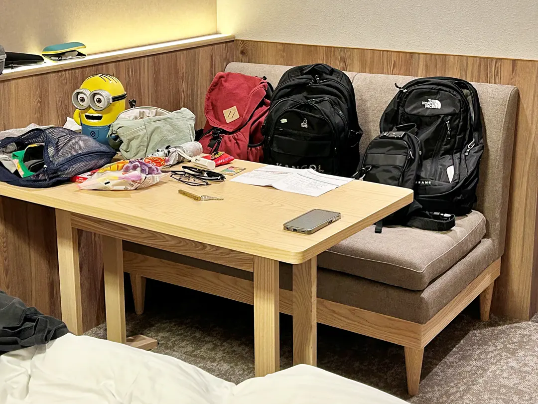 The table was spacious enough for enjoying late-night snacks and spreading out luggage.