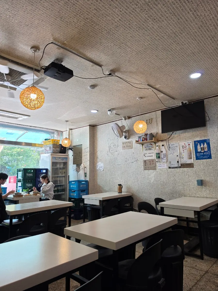 Interior view of Tokkiwa Geobukjeon, showing a cozy and traditional dining atmosphere