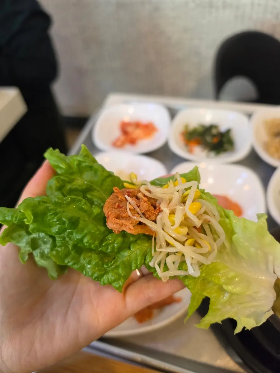 Fresh lettuce for making ssam (wraps) with Jeyuk-bokkeum and side dishes