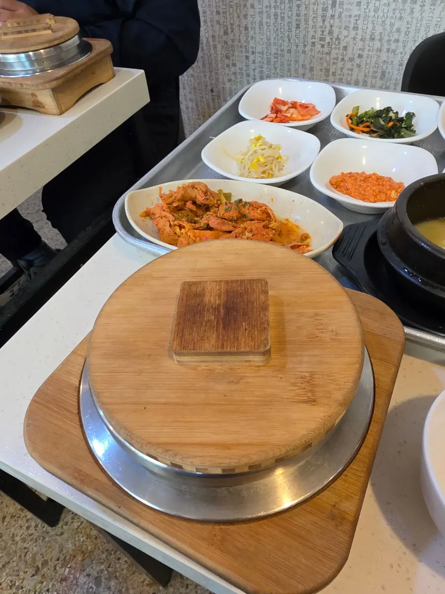 Steaming hot stone pot rice, a staple of traditional Korean meals