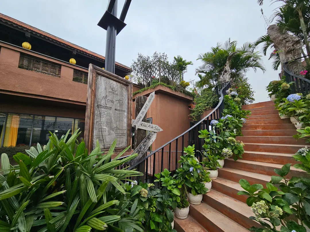 Stairs leading up to the 5th-floor rooftop garden