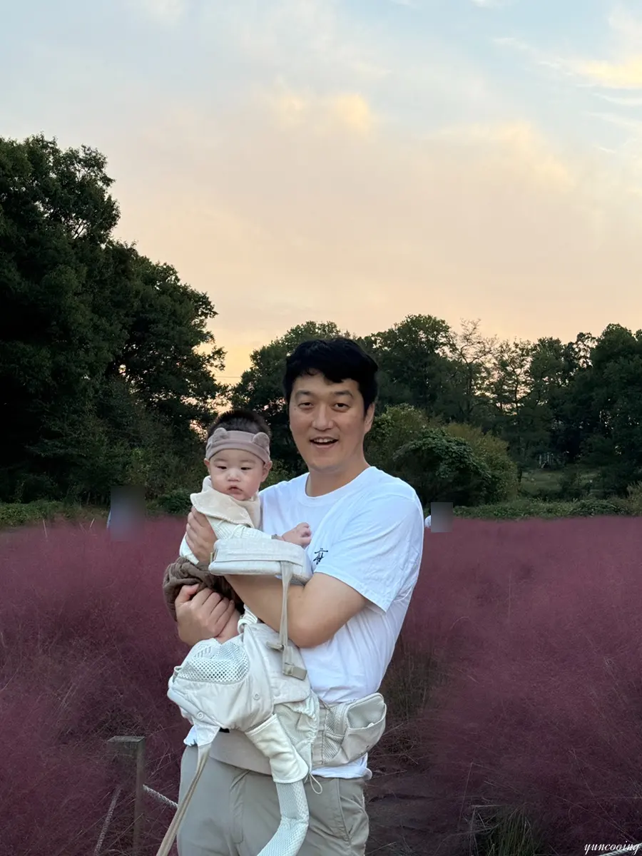 Dad and baby posing