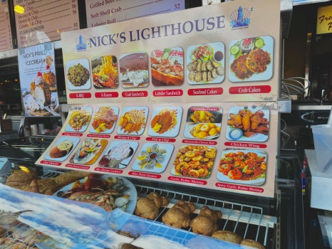 A delicious looking plate of fried shrimp and french fries.