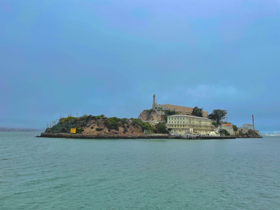 A view of Alcatraz Island from the ferry on a foggy day.