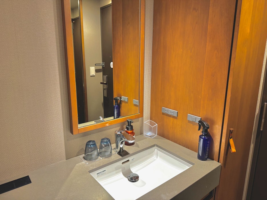 The clean and modern bathroom with a compact design and essential fixtures.