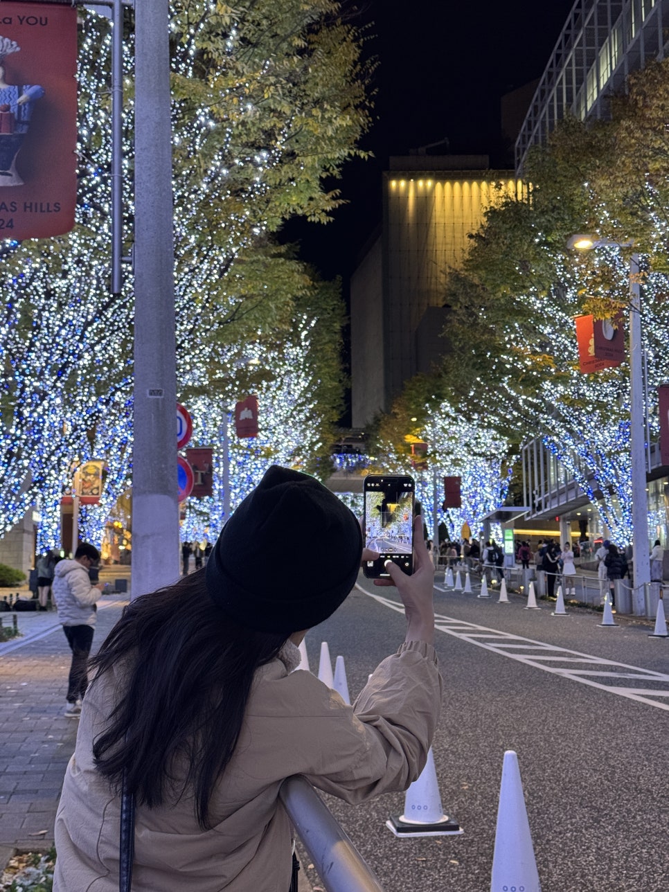A person wearing a stylish winter jacket, suitable for Tokyo's December weather.