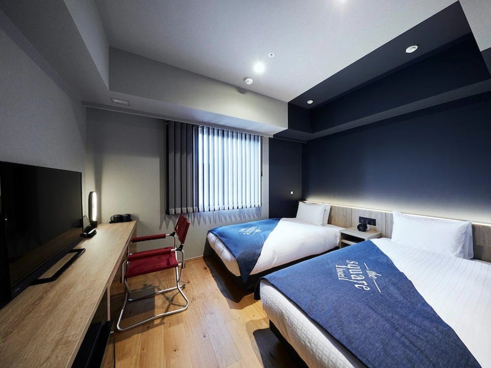 The stylish and modern lobby of The Square Hotel Ginza.