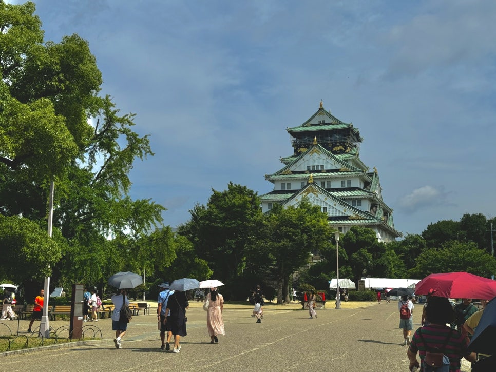 The iconic Glico Running Man sign in Dotonbori, Osaka at night